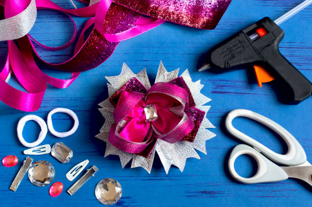istock Making bow for girl's hairstyle 1148622957