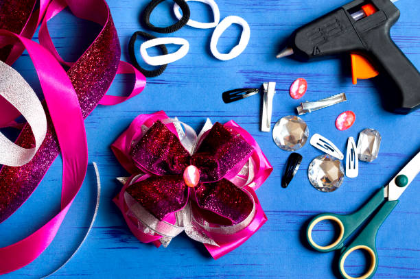 istock Making bow for girl's hairstyle 1148622959