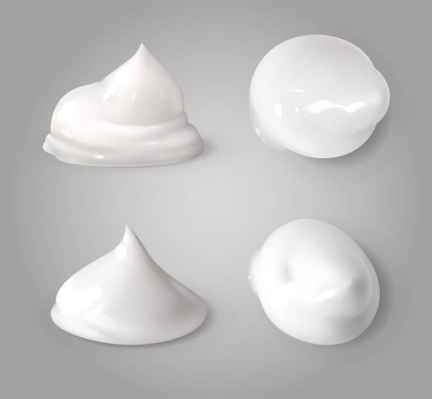 ilustrações de stock, clip art, desenhos animados e ícones de realistic cream foam. white mousse or foaming milk gel drops light ointment beauty product vector texture forms - cream