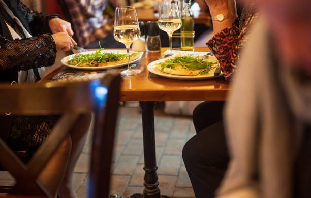 istock Senior women eating pizza 1148629412