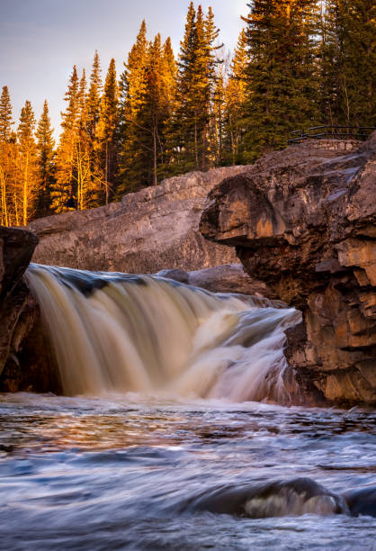 istock Sunrise Elbow Falls Kananaskis, Alberta, Canada 1148633487