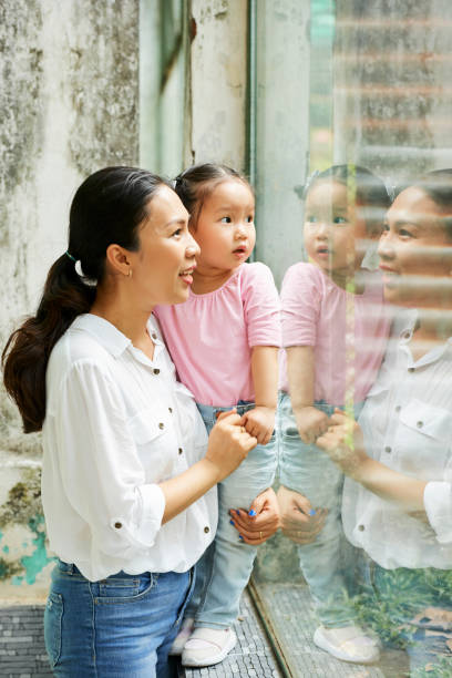 istock Excited mother and daughter in zoo 1148633683