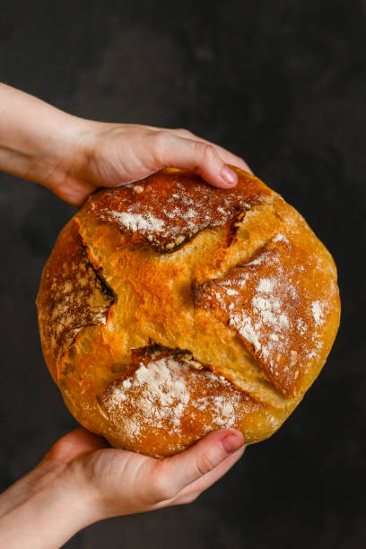 istock bread wheat (fresh pastries snack). food background. top 1148633746