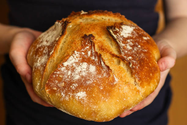 istock bread wheat (fresh pastries snack). food background. top 1148633755