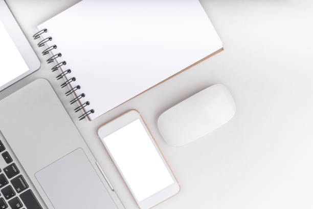 istock Top view tablet,smartphone ,mouse and keyboard on office desk.Top view with copy space 1148633957