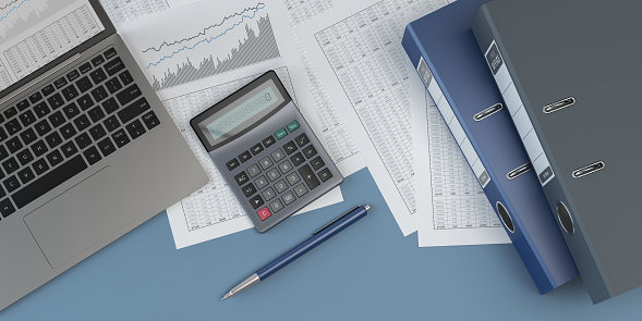 Close up cropped of woman calculating and paying bills, using digital tablet and calculator, young female planning budget, managing expenses, finances, checking, financial documents, internet banking service