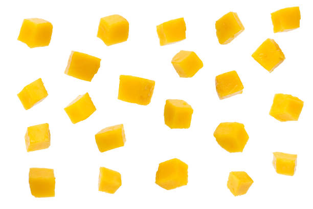 istock mango slice cut to cubes isolated on white background 1148635107