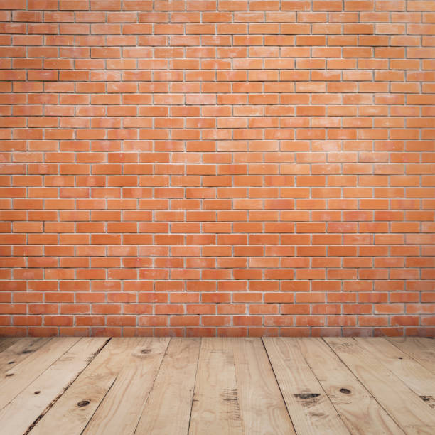 istock Old red brick wall and wood floor background and texture with copy space 1148636293