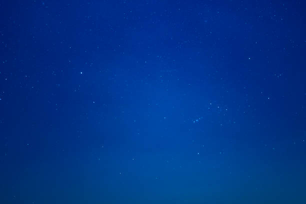 istock Starry night sky over dune dessert 1148636513