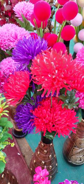 istock Colorful flowers in flower pot 1148636542