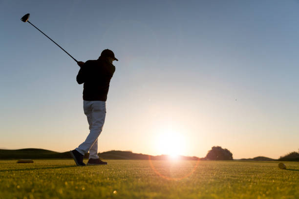 istock Golf player shoting ball - Sunset Time -  Links Golf 1148641902