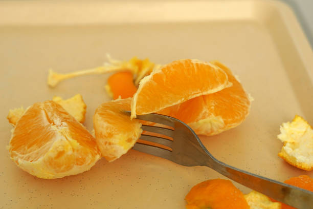 This is fruit served on the tray and photographed on white plate
