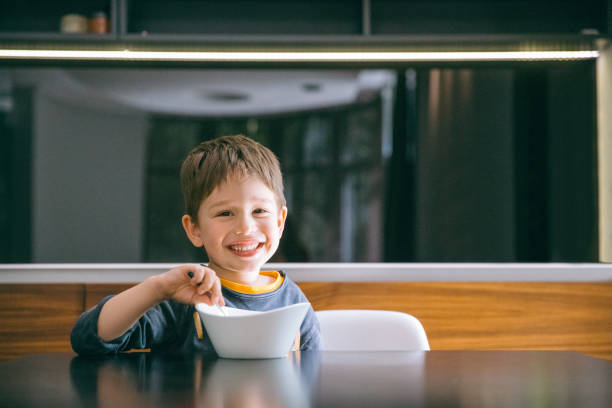 istock Boy enjoining his food 1148644131