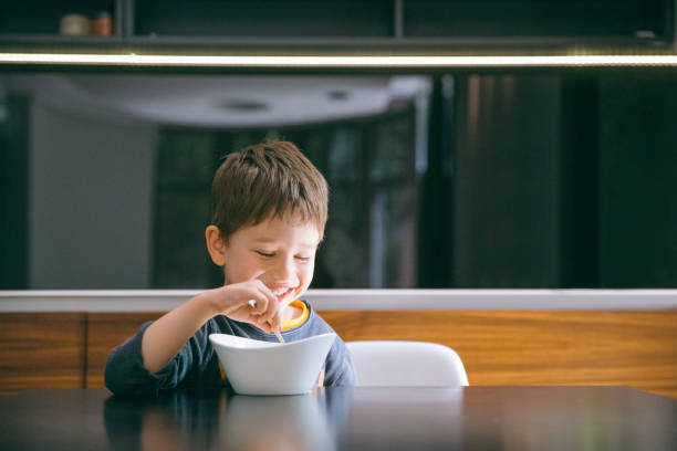 istock Boy enjoining his food 1148644972