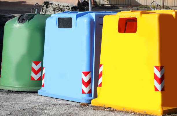 istock three colored dumpster to collect glass used paper and plastic m 1148646957