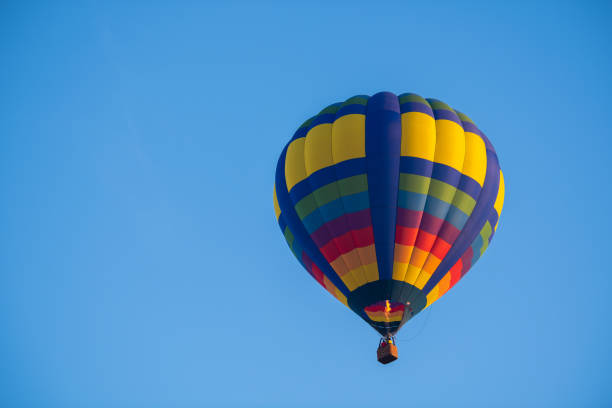 istock Colourful of balloon on blue sky with copy space 1148647559