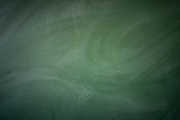 istock Old, green school blackboard with chalk 1148647588