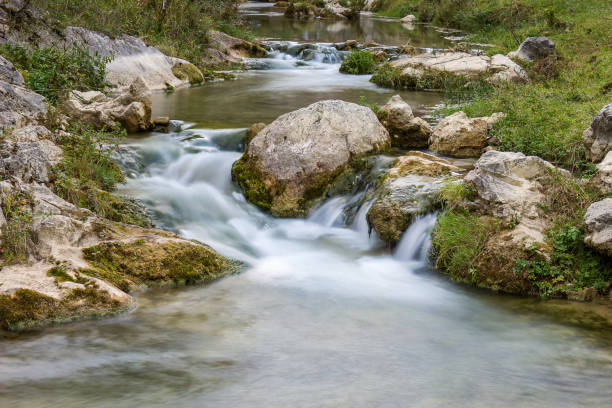 istock Long exposure mountain creek cascading through the rocks in a canyon 1148648328