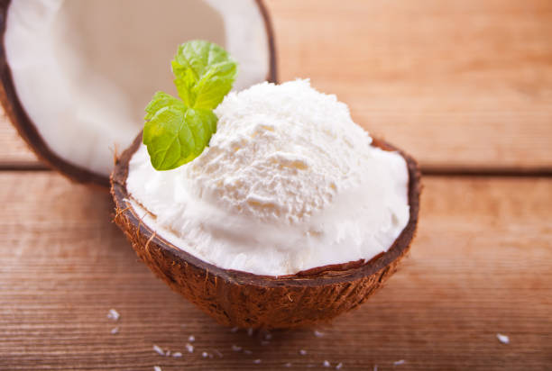 istock Coconut ice cream on the wooden table with mint leaf 1148648964