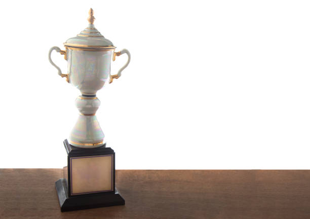istock Marble trophy on wooden table isolated. Winning awards with copy space. 1148649248