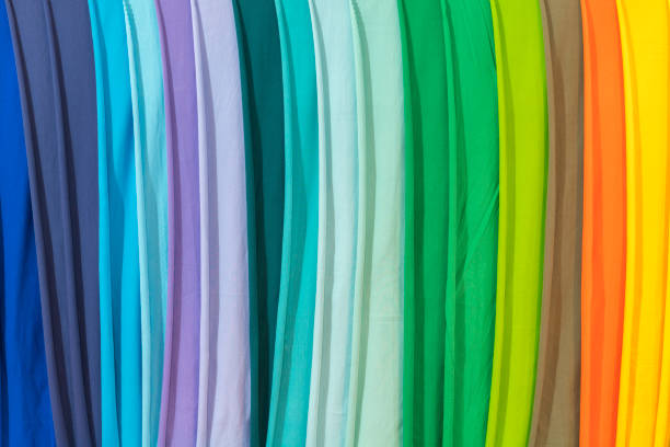 istock Photo picture Samples of colored cloth background texture. crumpled fabric. 1148651372