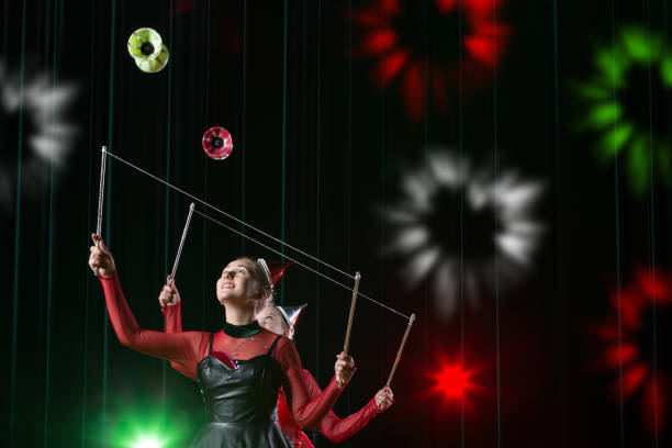Two girls circus actress juggling