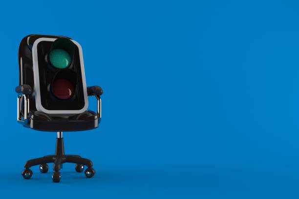 istock Green traffic light on business chair 1148658564