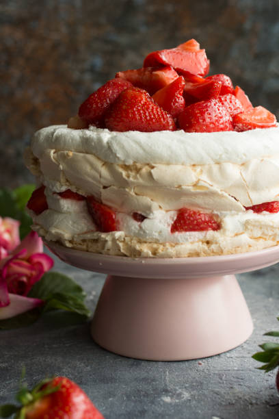 istock Pavlova with whipped cream and strawberries. 1148661843