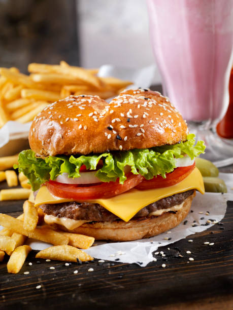 istock Classic Cheeseburger on a Brioche Bun with Fries and a Milkshake 1148662510