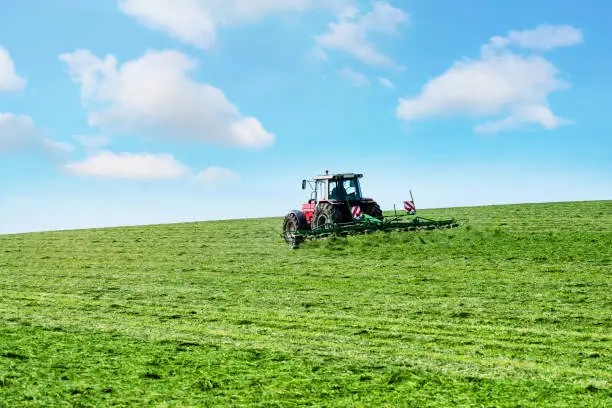 farmer returning the hay