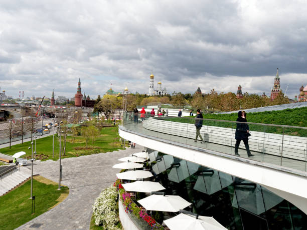 Moscow, Russia - May 03, 2019: wide view of tourists walking while visiting Zaryadye park
