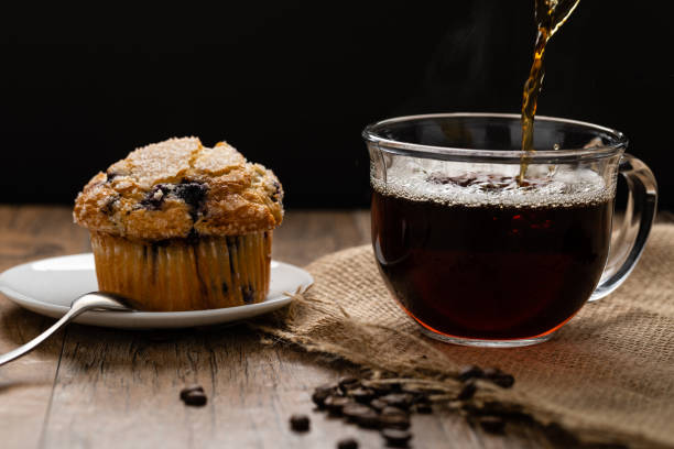 istock Hot Coffee with a Muffin in Black and White 1148666460