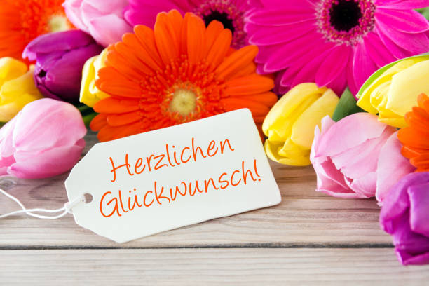 немецкий с днем рождения этикетки и цветы - bouquet tulip greeting card gerbera daisy стоковые фото и изображения