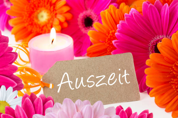 istock German Timeout label and flowers with candle 1148670550
