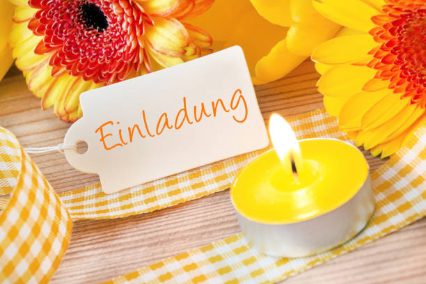 istock German invitation card and flowers with candles 1148670570