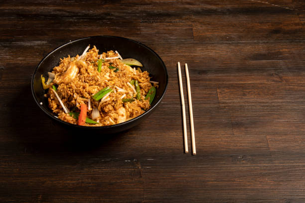 Studio shot of a special fried rice with shrimps.Similar shrimp fried rice below: