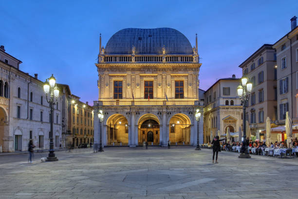 Brescia, Italy Twilight scene in Piazza della Loggia, Brescia, Italy. brescia stock pictures, royalty-free photos & images