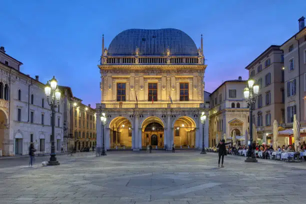 Twilight scene in Piazza della Loggia, Brescia, Italy.