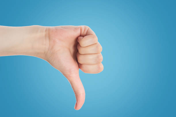 istock Pointing gesture. Female hand shows index finger on a white background isolate 1148678643