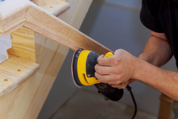 istock A wooden staircase grinder work on timber wood railings installed 1148681438
