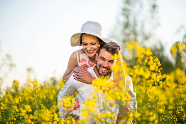 istock Happy young couple enjoying in nature 1148686691
