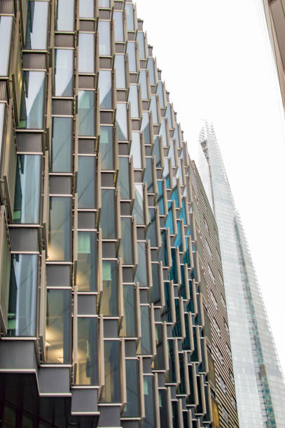 istock Skyscrapper windows in london with glasses and bars 1148692890