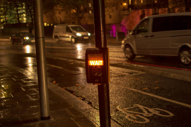 istock Wait sign box button in london which is used by foot walkers 1148695421