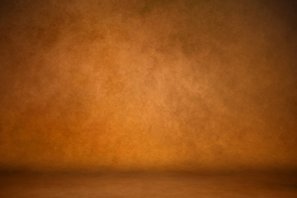 istock Background studio portrait backdrops brown canvas background on the wall and on the floor with a soft transition. 1148695451