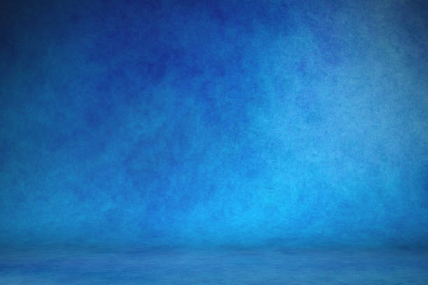 istock Studio portrait backdrops traditional painted canvas or muslin fabric cloth studio backdrop or background, suitable for use with portraits, products and concepts. Dramatic, blue modulations 1148695462