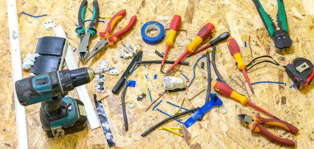 Various tools for electric work Various tools for electric work on a panel of chipboard screen saver photos stock pictures, royalty-free photos & images