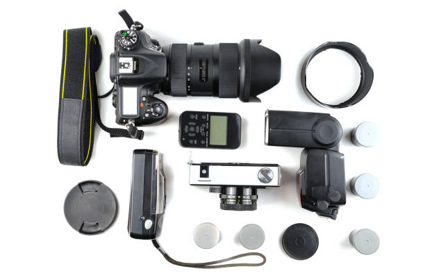 istock Different generations of cameras and a flash with a sync on a white background 1148700483
