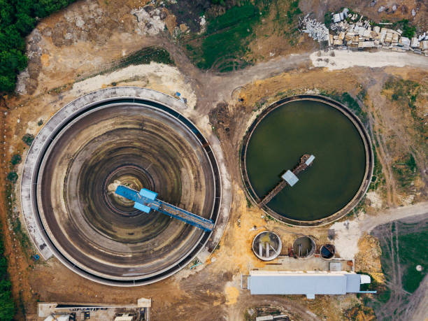 istock Round clarifiers at wastewater treatment plant, top view from drone 1148700509