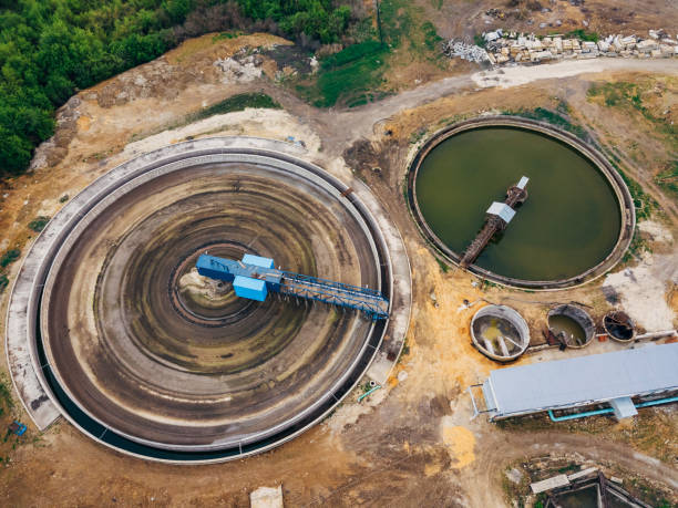 istock Round clarifiers at wastewater treatment plant, top view from drone 1148700513