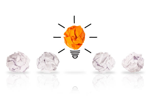 istock Idea Concepts Light Bulb Crumpled Paper on White Background 1148705066